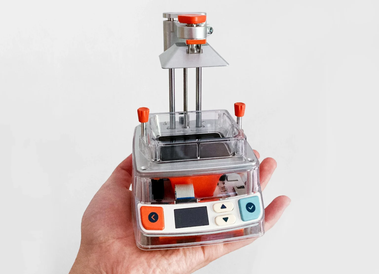 TinyMaker: The Palm-Sized Open-Source Resin 3D Printer for 3D Nomads